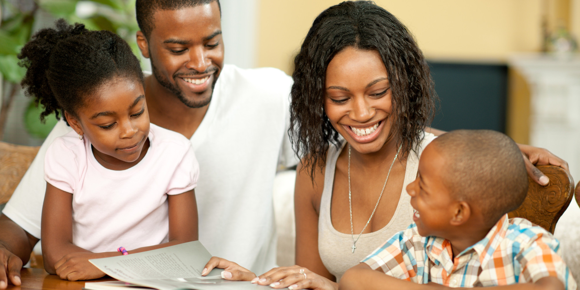 A man, woman, and two young children